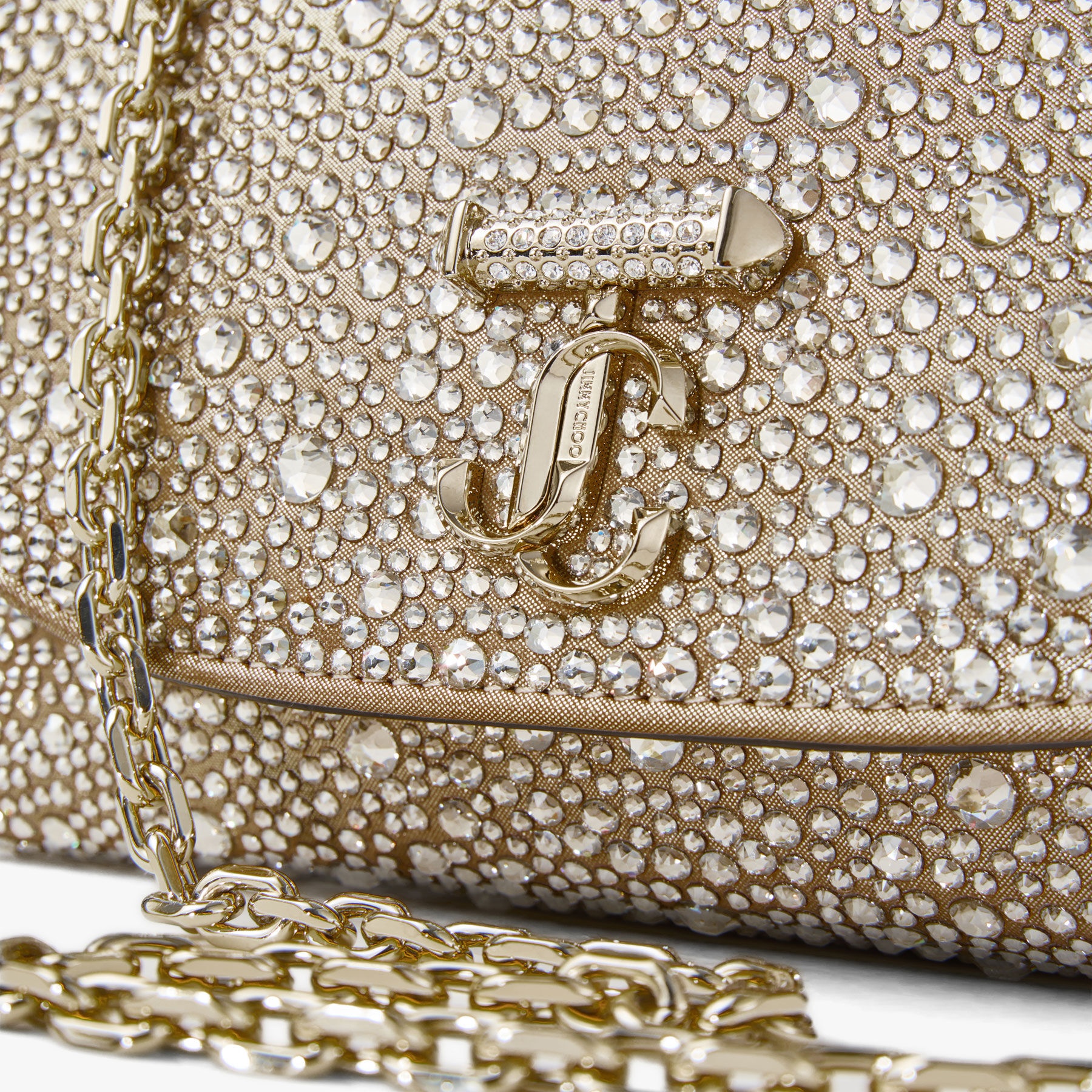 Curve Crossbody S
Gold Shimmer Suede Crossbody Bag with Hotfix Crystals - 3