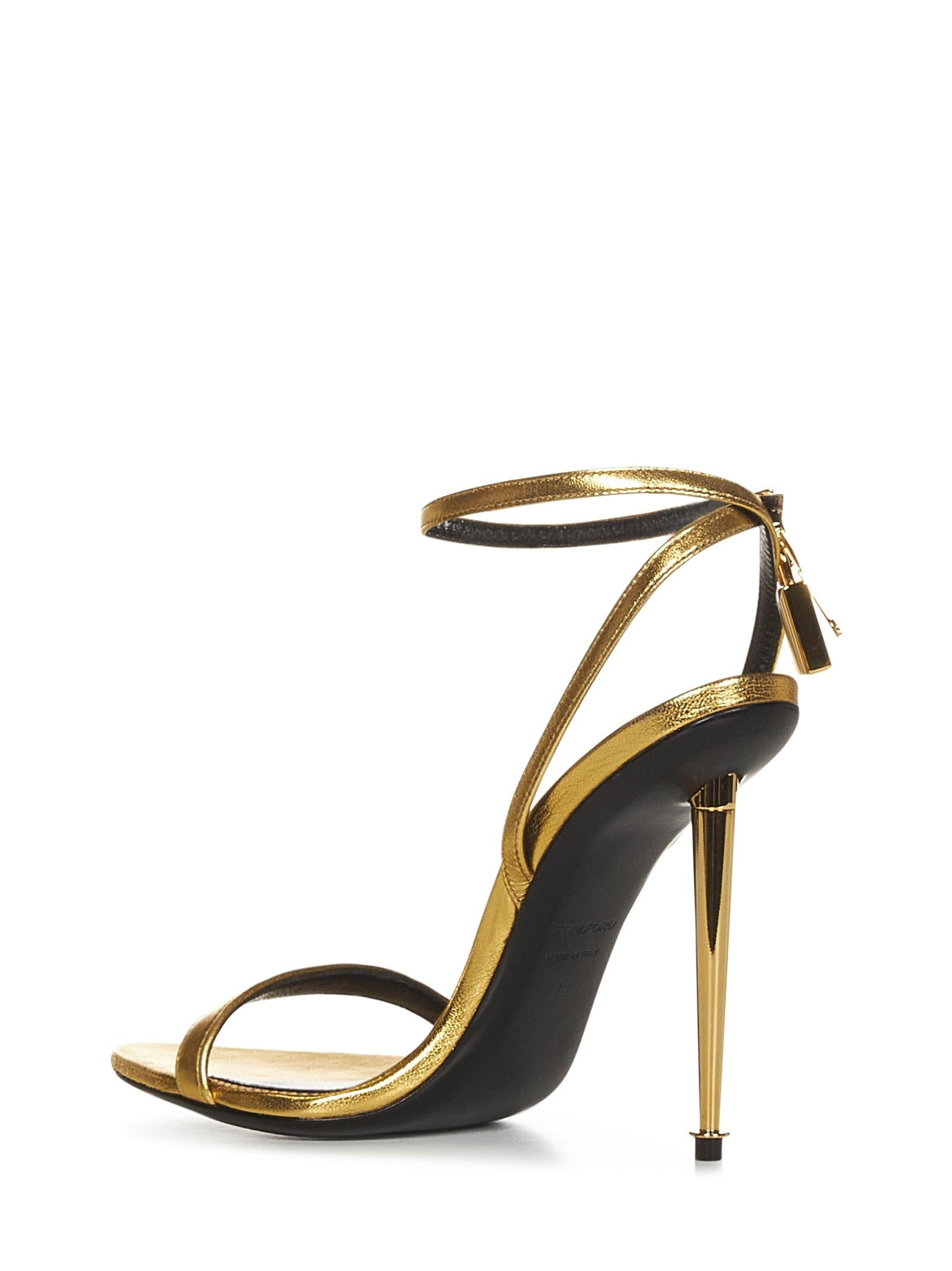 Gold laminated nappa leather sandals with golden metal padlock and spike heel. - 3