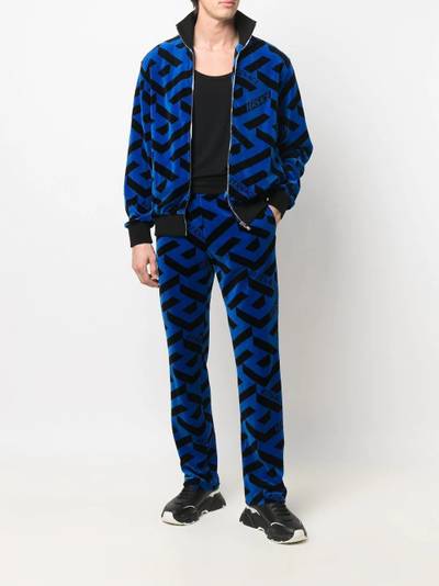 VERSACE geometric-pattern track pants outlook