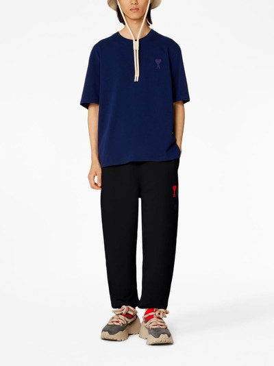 AMI Paris embroidered-logo cotton track pants outlook