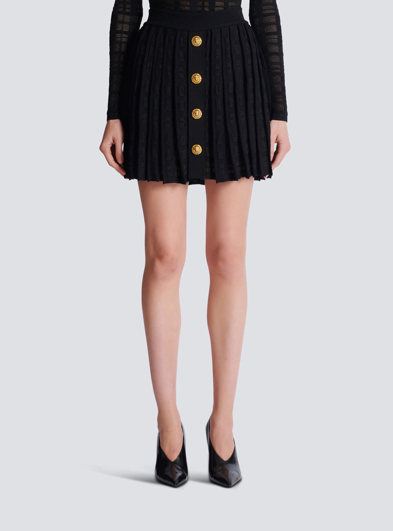 Short pleated skirt in plaid knit 5