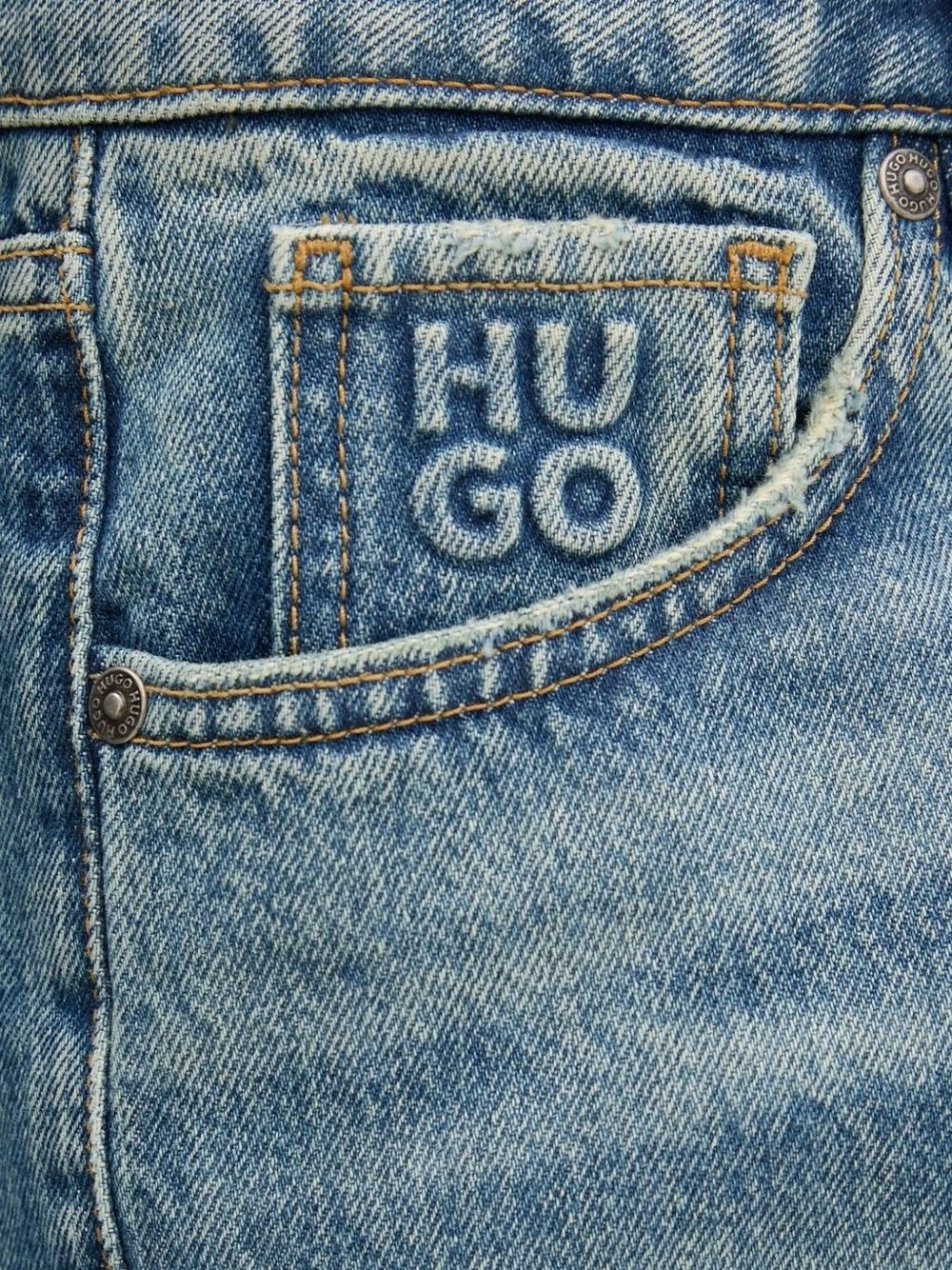 logo-embossed jeans - 4