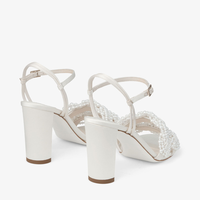 JIMMY CHOO Cary 85
Ivory Satin Block Heel Sandal with Pearl Embellishments outlook