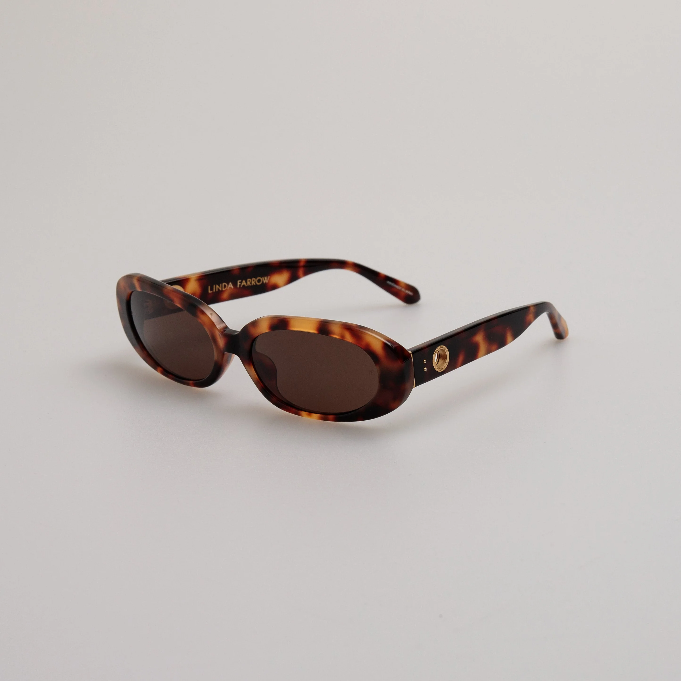 LINDA FARROW CARA OVAL SUNGLASSES IN TORTOISESHELL | REVERSIBLE display picture 1