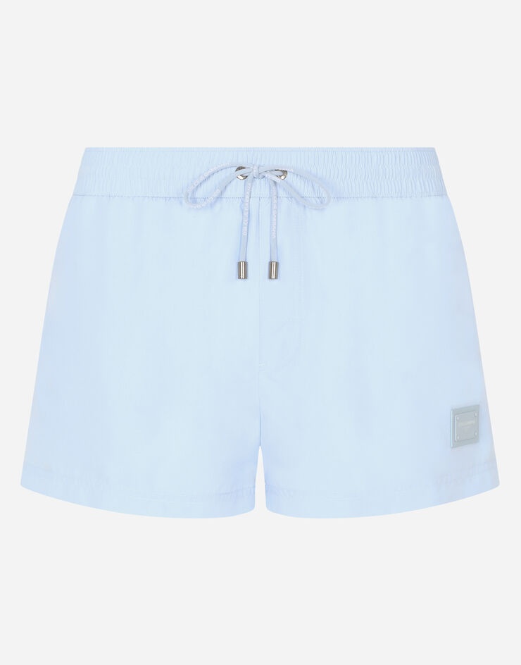 Short swim trunks with branded plate - 1