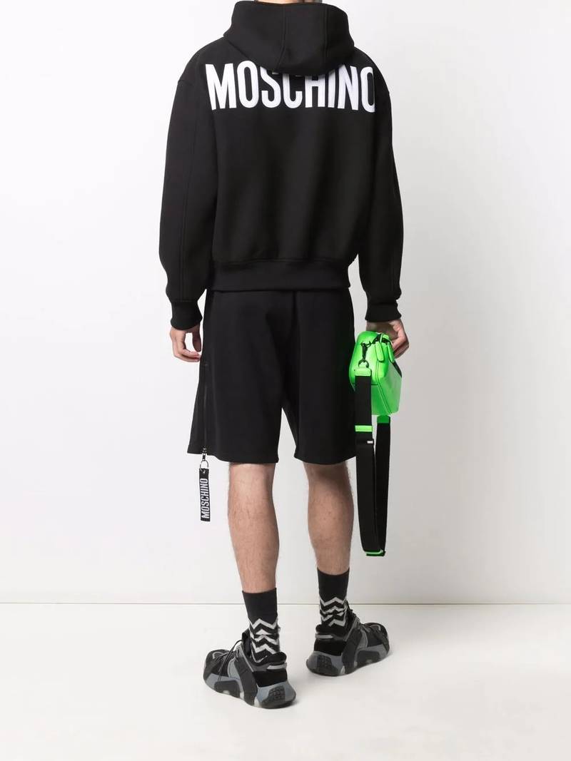 Moschino logo-appliqué zipped hoodie outlook