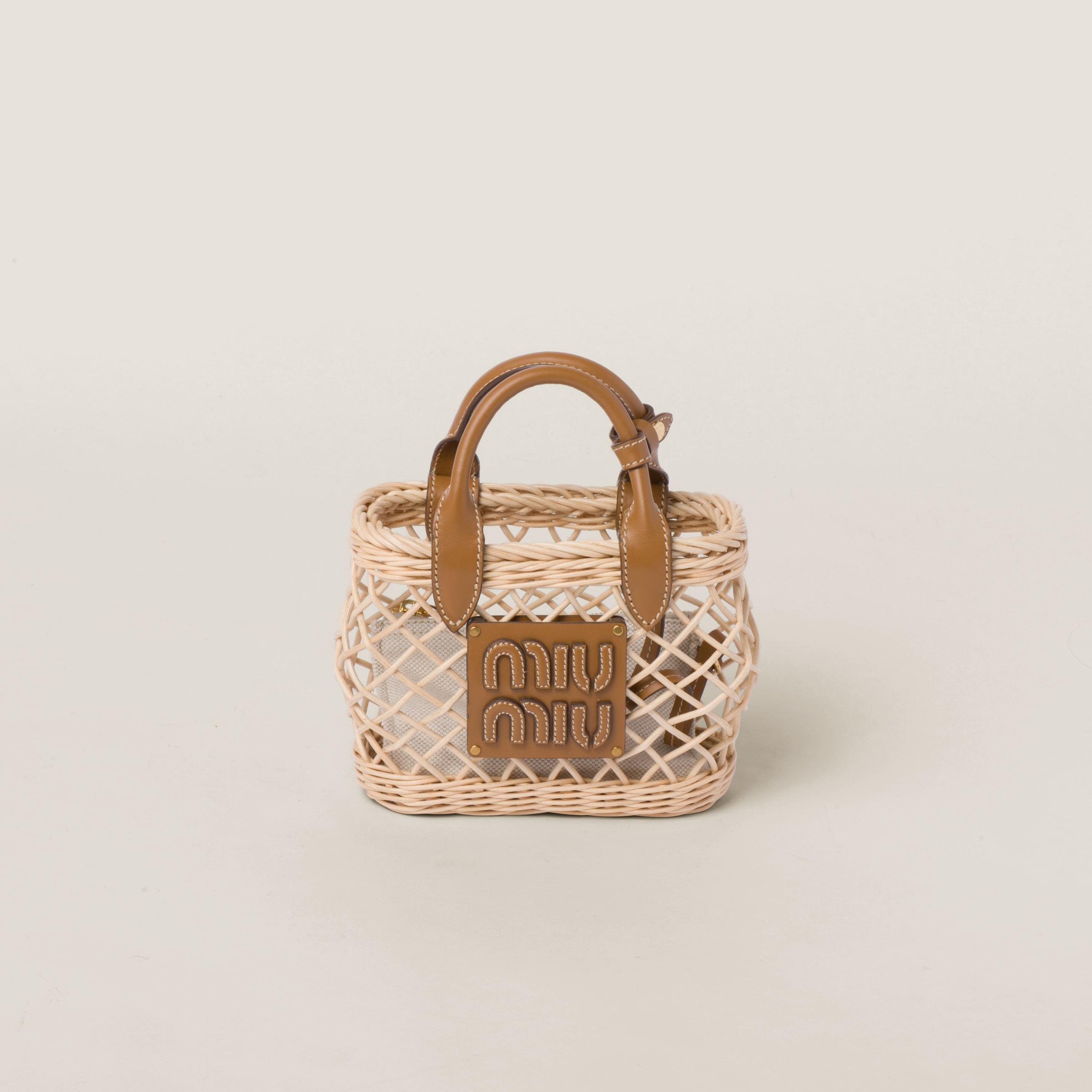 Woven fabric handbag with leather trim - 1