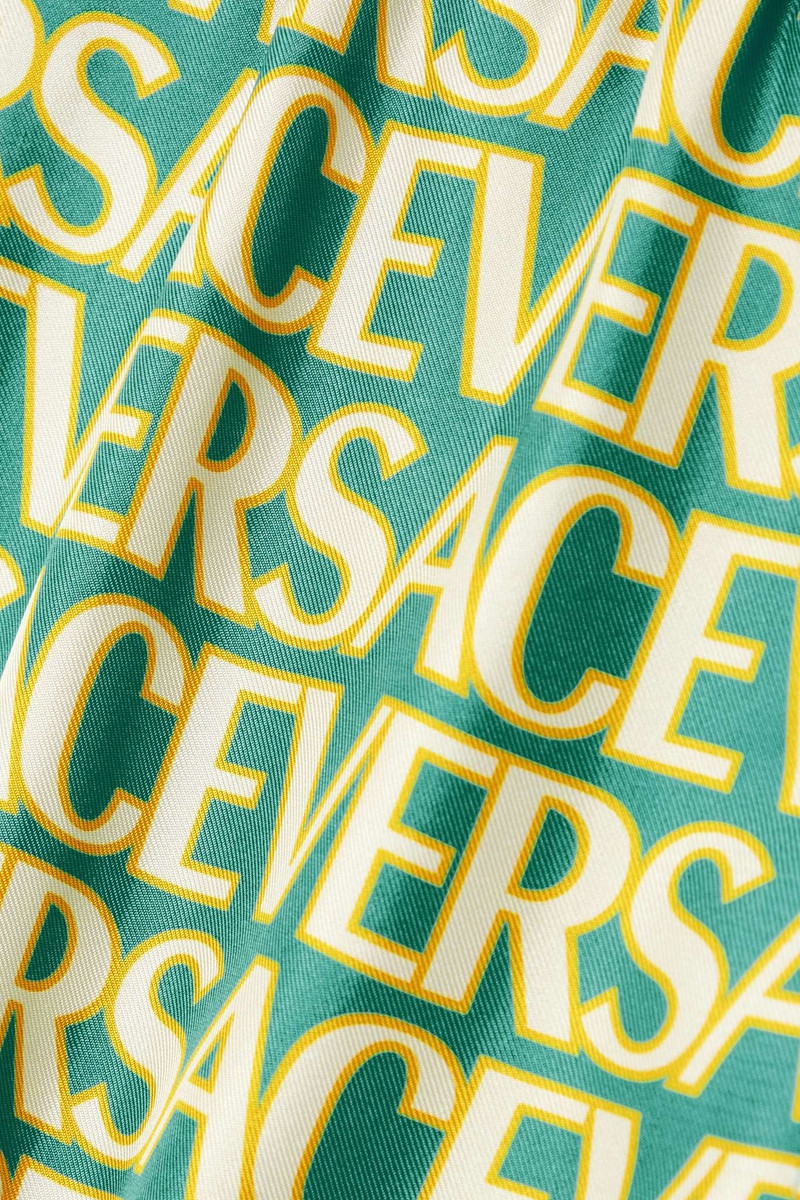 + Dua Lipa printed silk-twill shorts 5