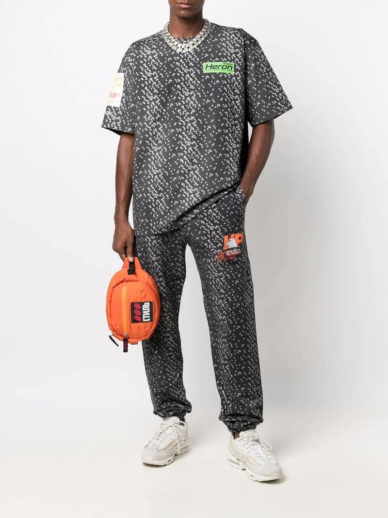 Heron Preston abstract-spot track pants outlook