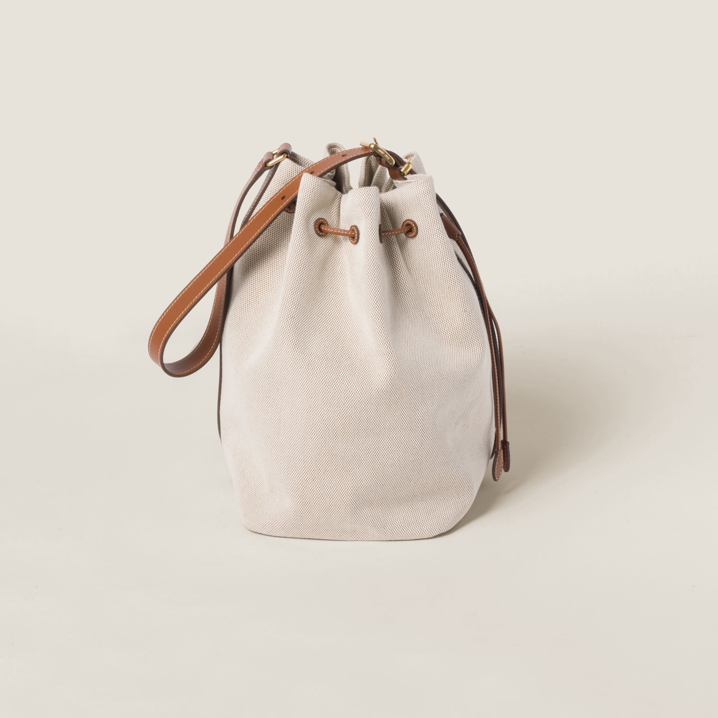 MiuMiu Bucket in canvas バケットキャンバスバック Miu Miu Canvas and leather bucket bag | REVERSIBLE