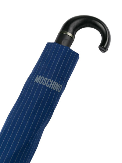 Moschino pinstriped umbrella outlook
