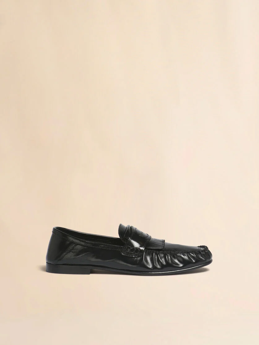 BLACK LEATHER TASSEL LOAFER WITH COLLAPSIBLE HEEL - 1