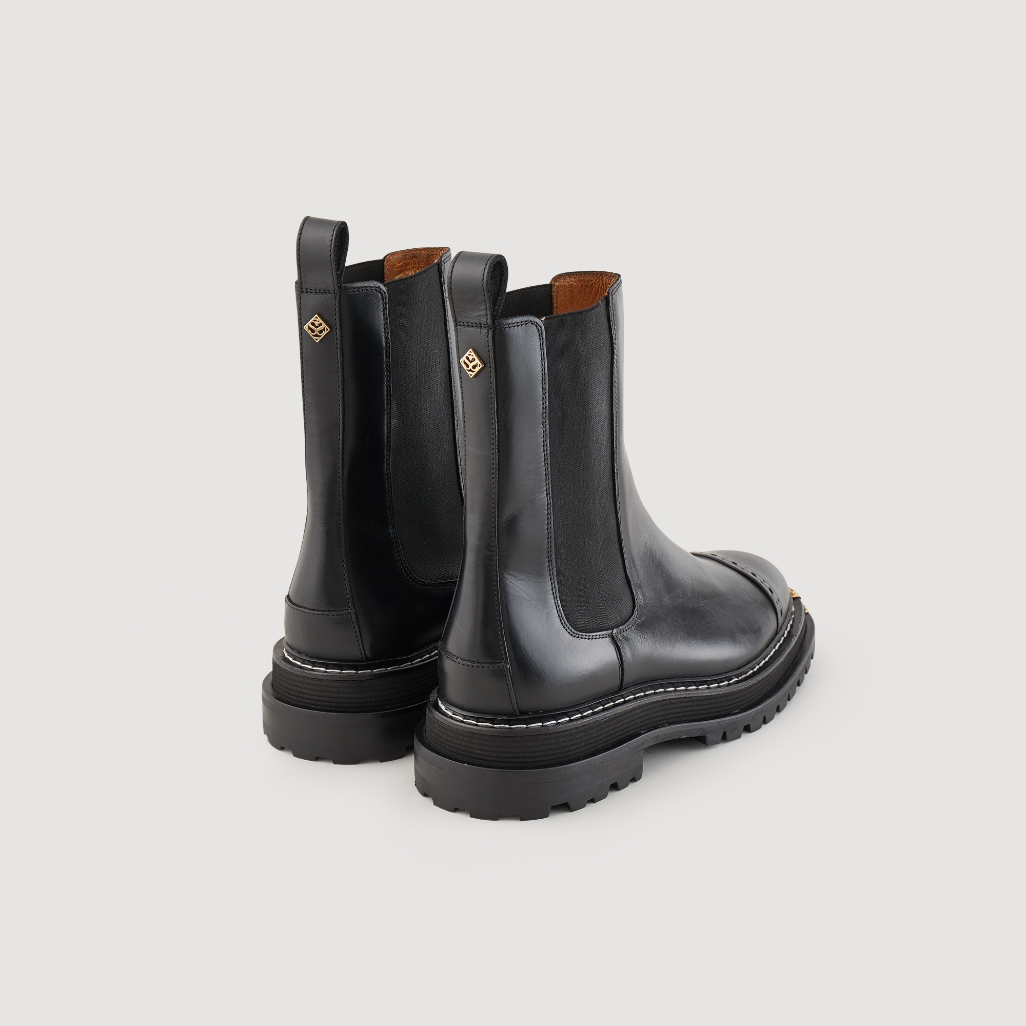 Ankle boots with notched sole - 3