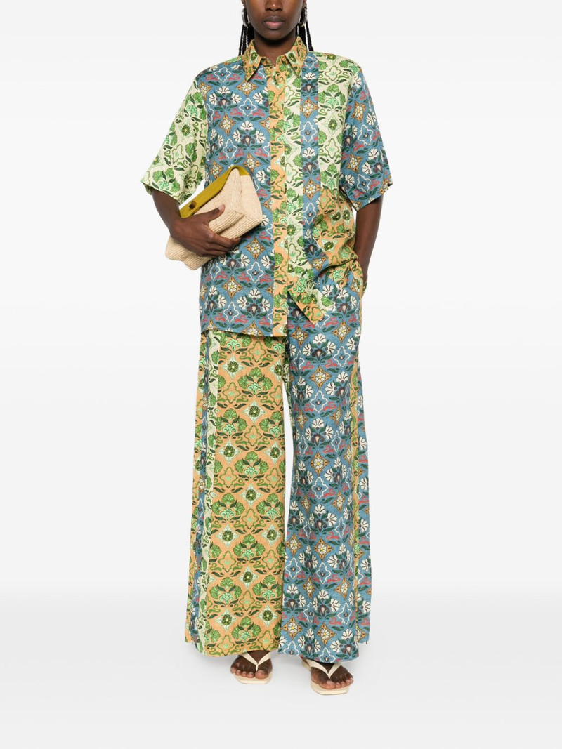 ALÉMAIS Ali Spliced floral-print trousers outlook