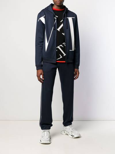 Valentino VLTN logo print side stripe track pants outlook