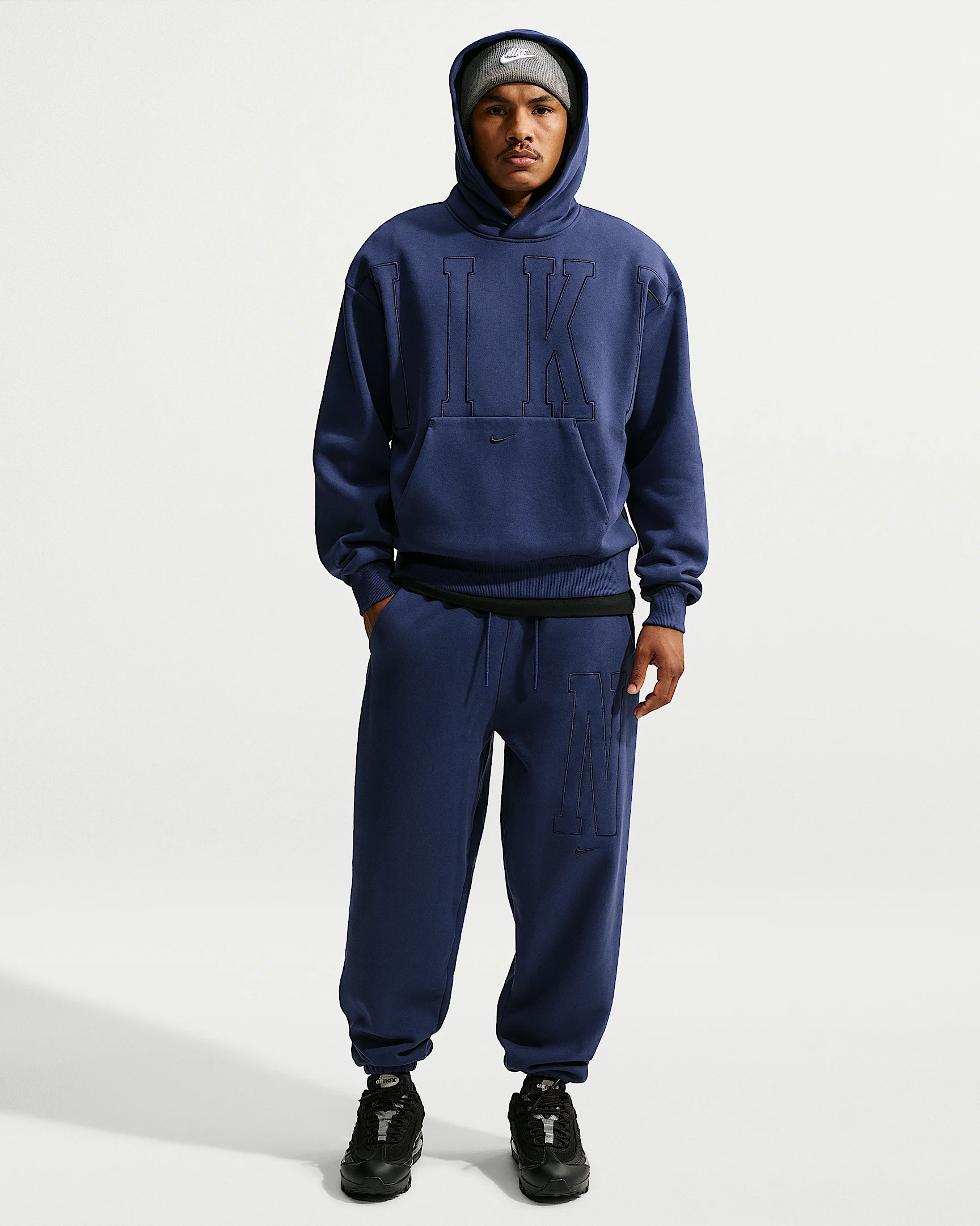 Nike Solo Fleece Men's Loose Cuffed Pants - 1