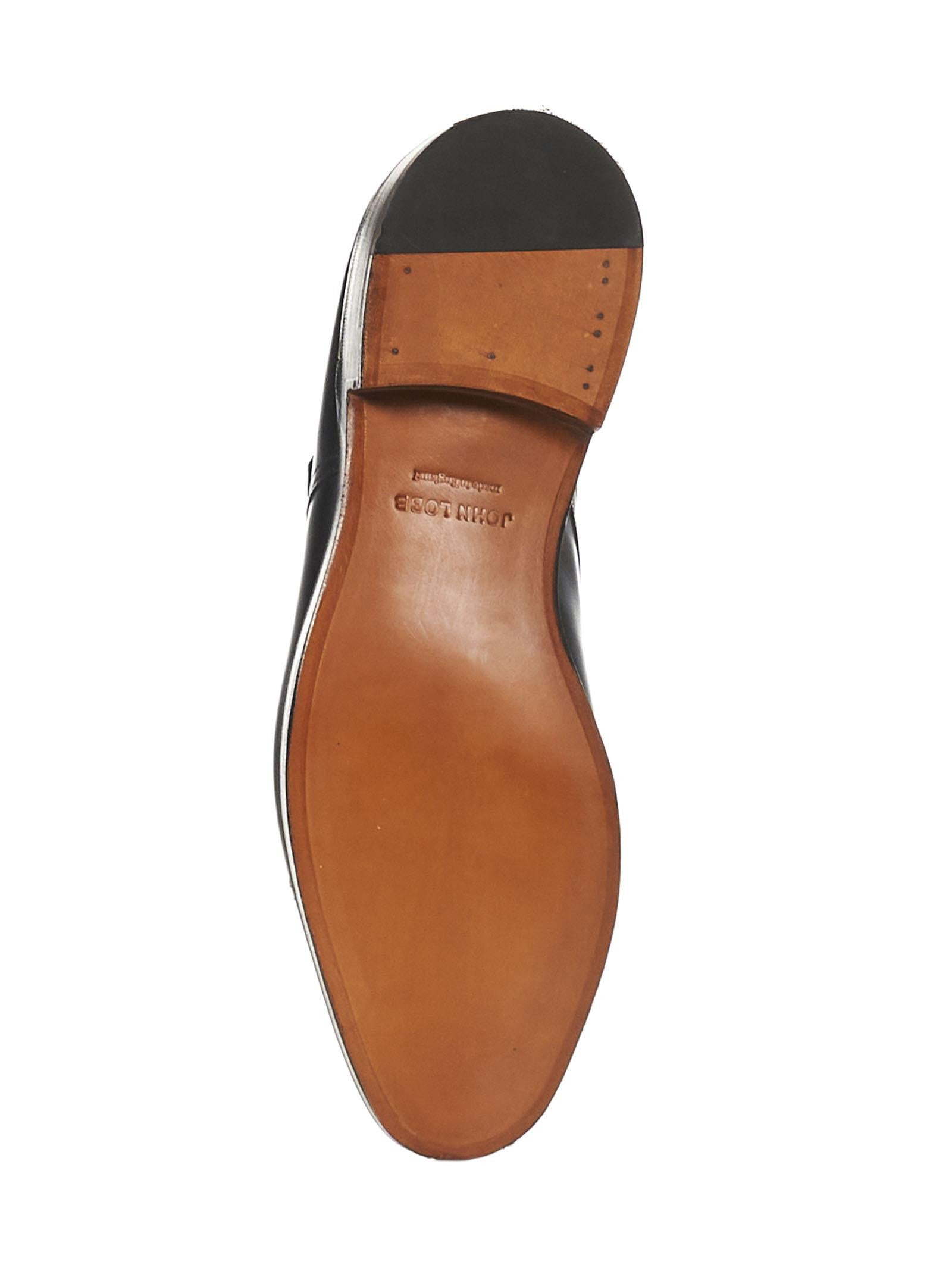 William lace-up in smooth black leather with double palladium finish buckle and double leather sole. - 5