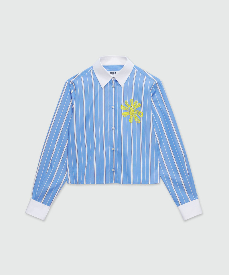 Striped light blue poplin shirt with sun detail 1