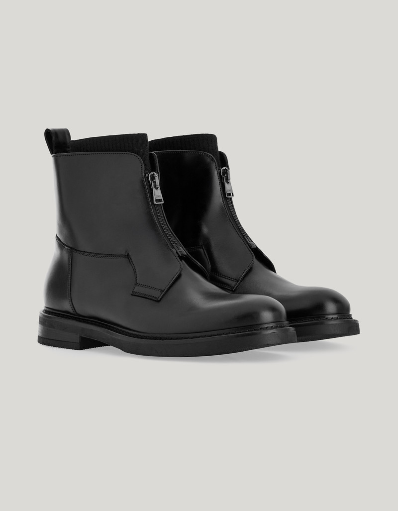 BLACK SMOOTH CALFSKIN ANKLE BOOT WITH ZIPPER AND KNIT SOCK 1