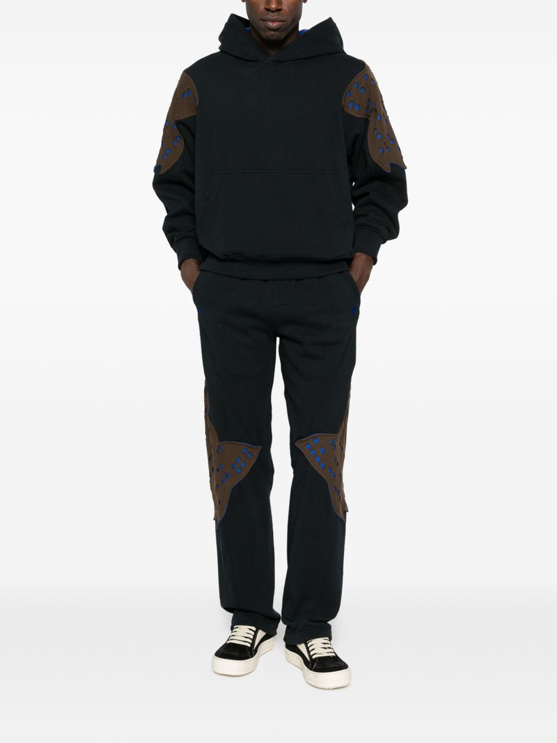 Kiko Kostadinov x Fox Lab perforated fleece jogger outlook