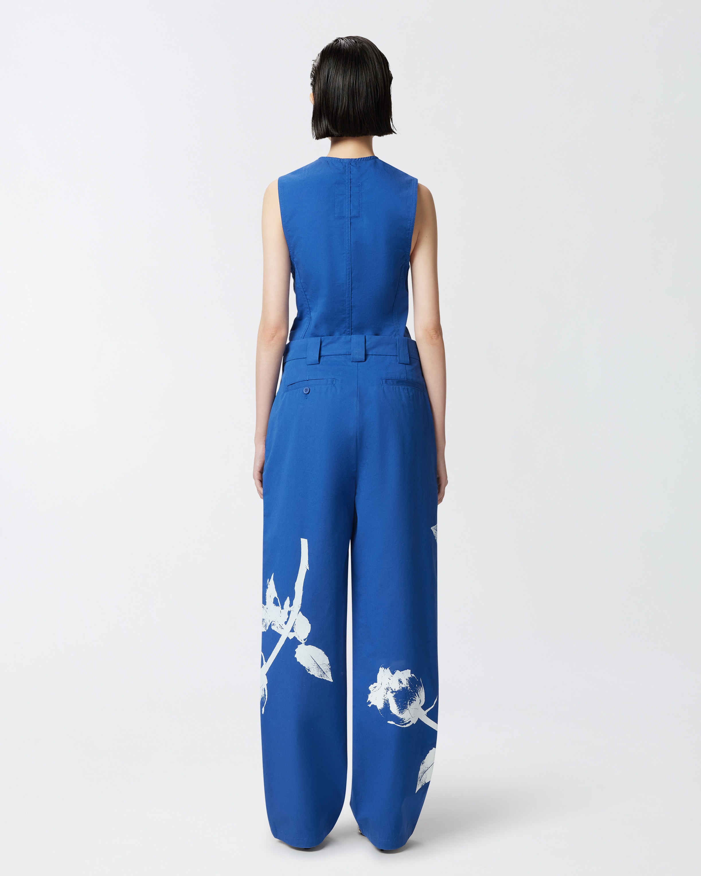 REIMAGINE BY PINKO X PATRICK MCDOWELL BLUE TROUSERS WITH CROSSOVER AND ROSE PRINT - 4