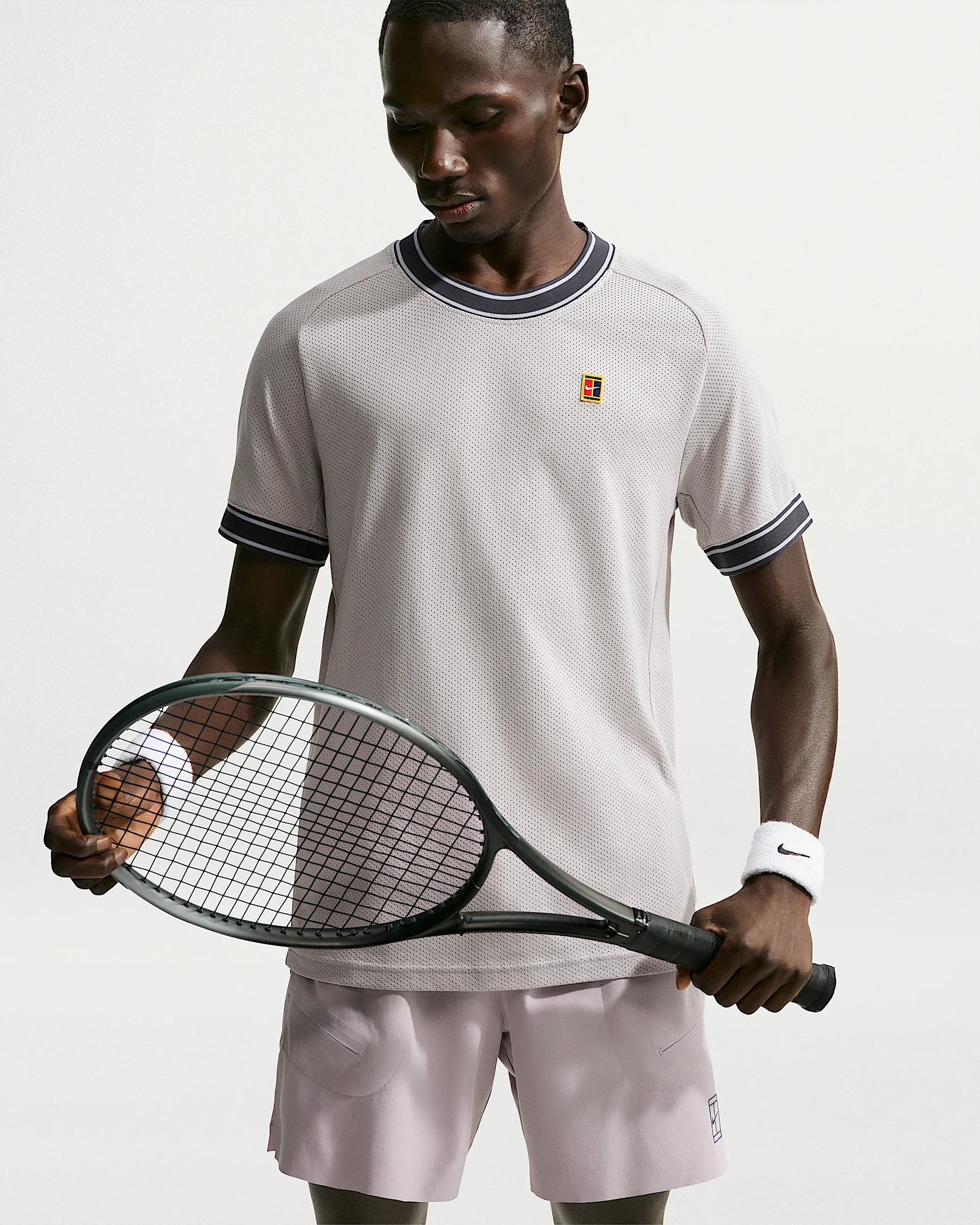 NikeCourt Heritage Men's Short-Sleeve Tennis Top - 1