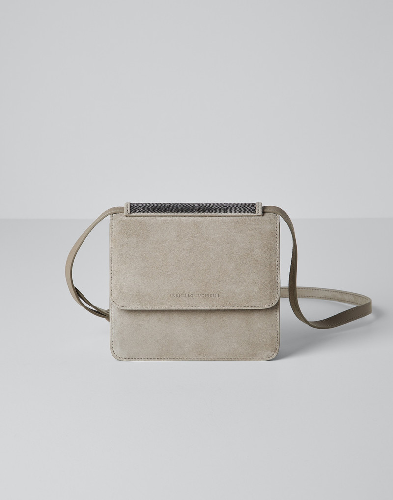 Suede bag with precious insert 1