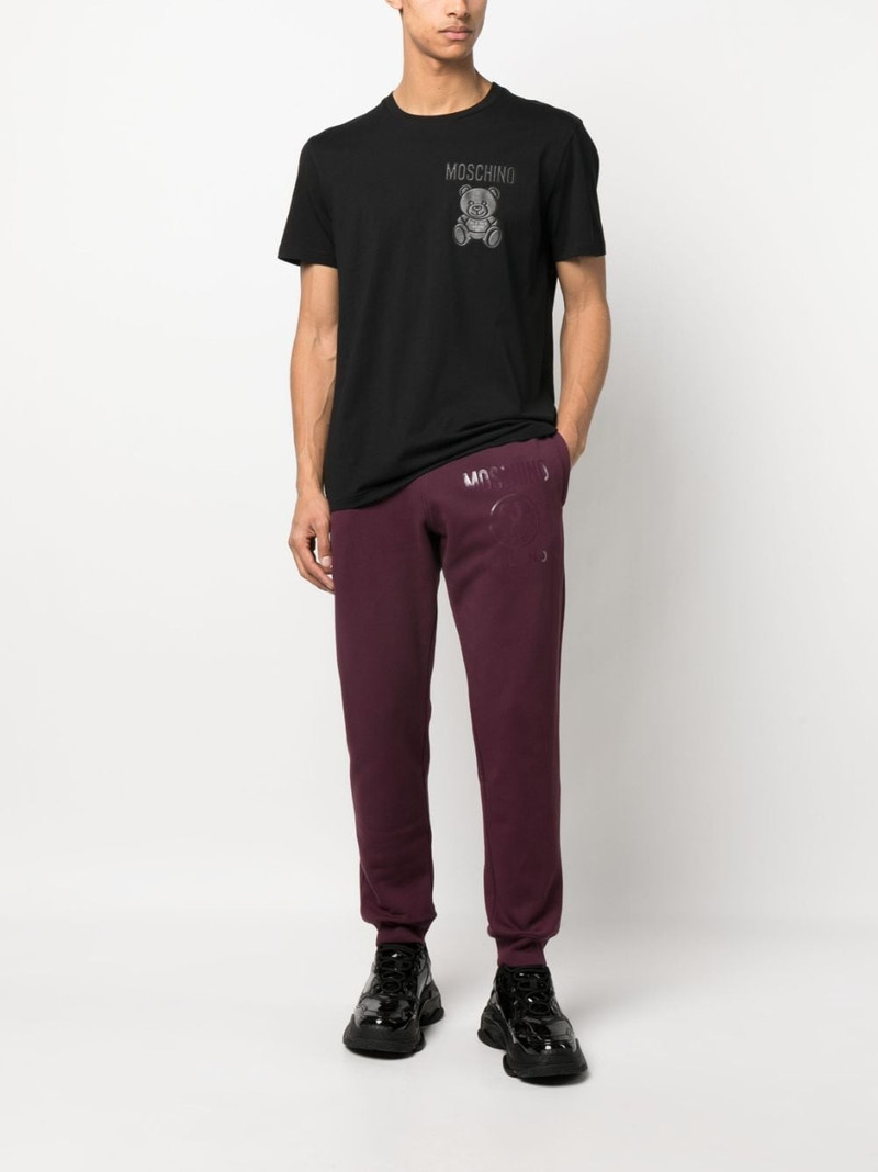 Moschino logo-print cotton track pants outlook