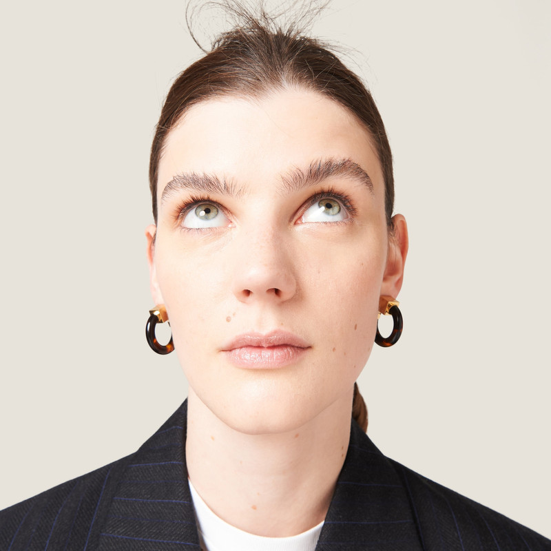 Miu Miu Plexiglas and metal earrings outlook