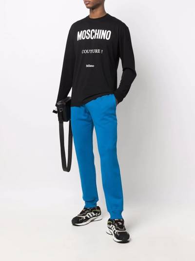 Moschino logo-print track pants outlook