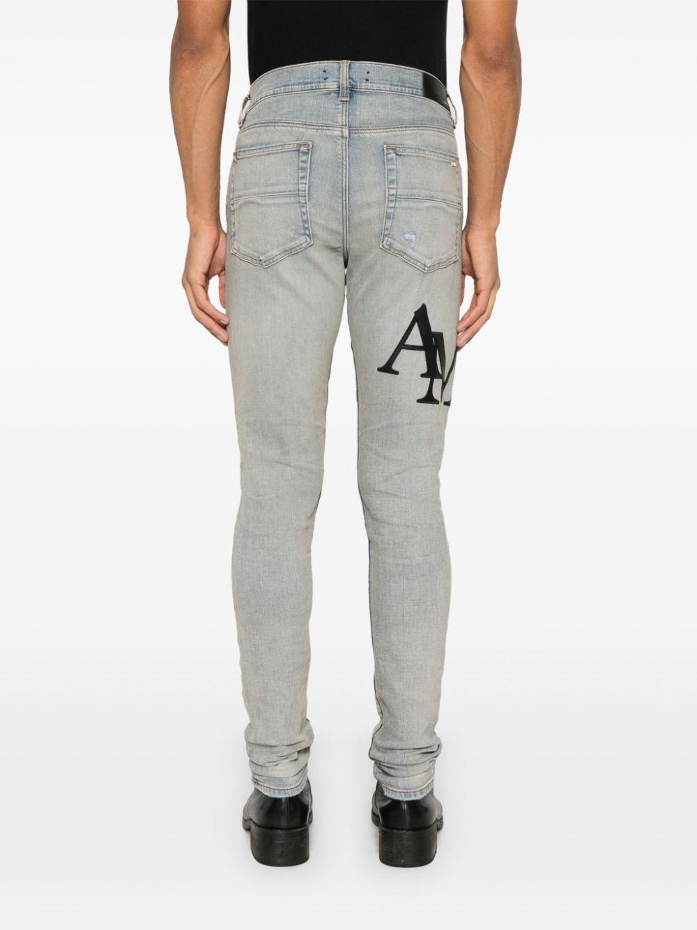 Staggered-logo jeans - 4