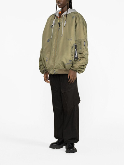 VETEMENTS graphic-print hooded bomber jacket outlook