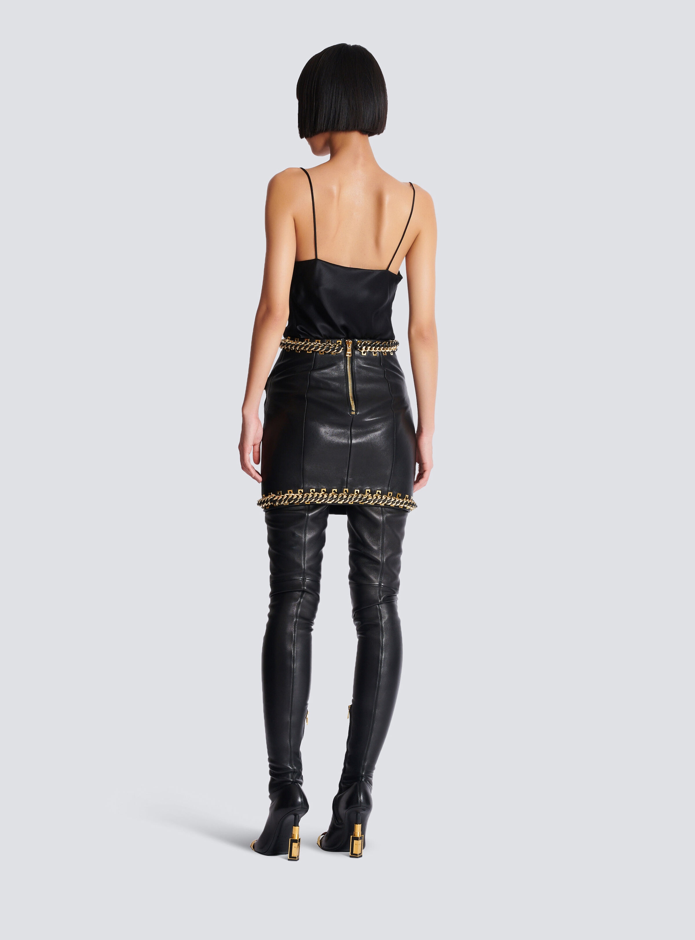 Short lambskin skirt with chains - 4