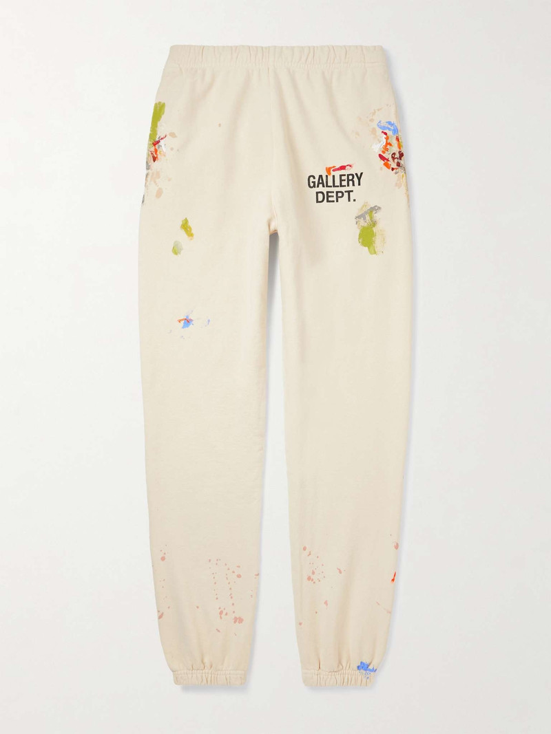 Tapered Logo-Print Paint-Splattered Cotton-Jersey Sweatpants - 1