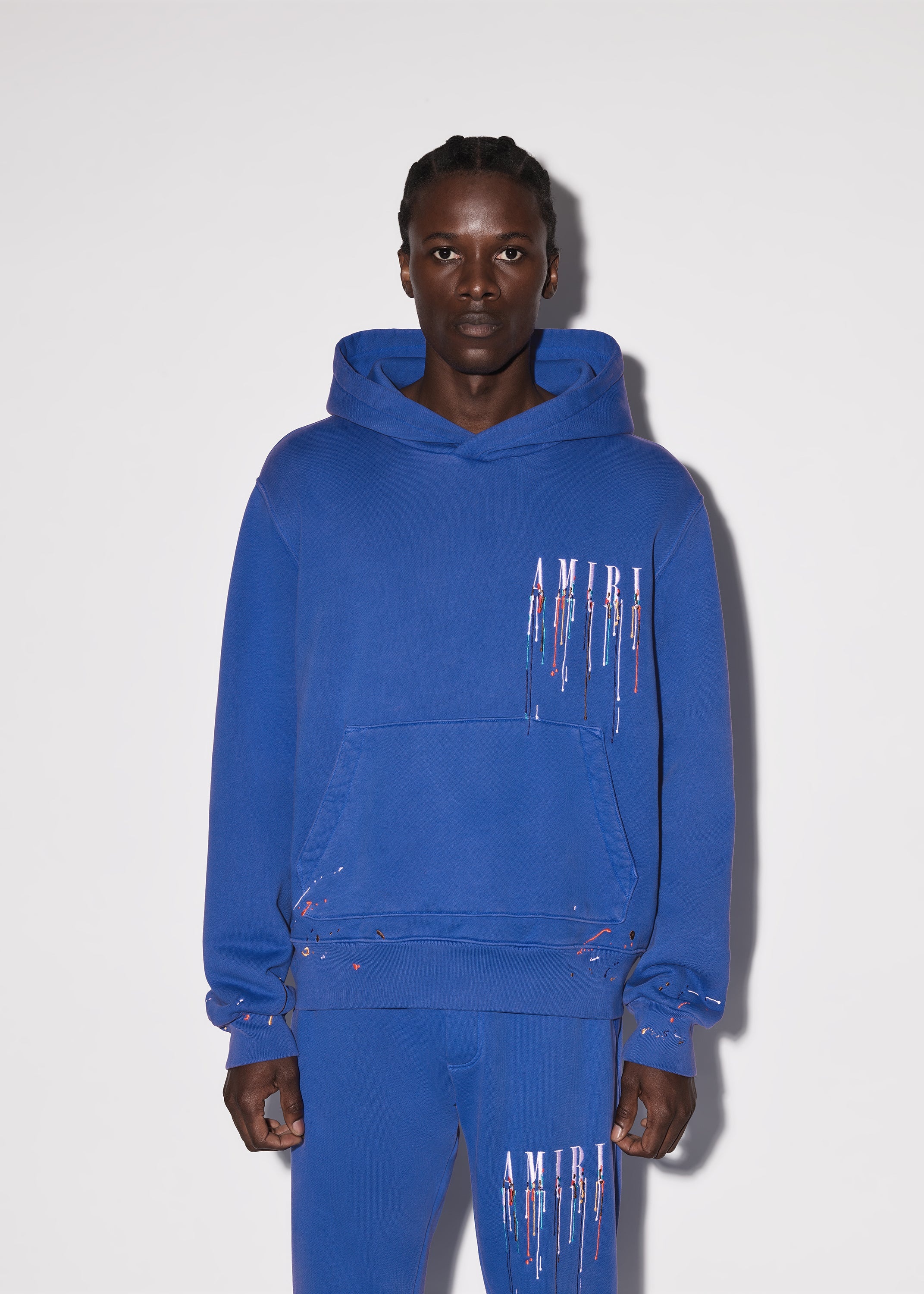Amiri Embroidered Paint Drip Core Logo Hood in Blue for Men