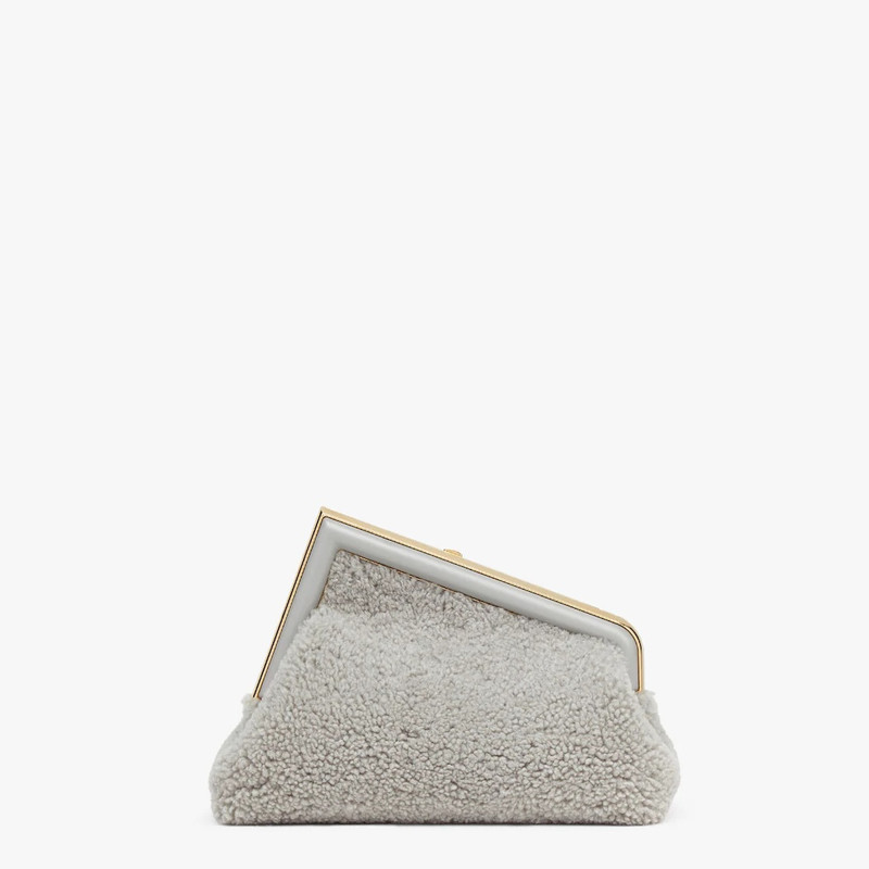 Small Fendi First bag made of soft, pale gray sheepskin with oversized metal F clasp bound in tone o 3