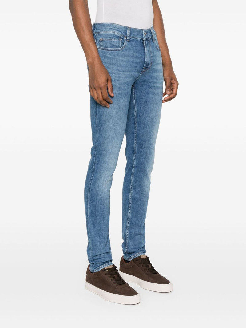 Paxtyn logo-patch jeans 3