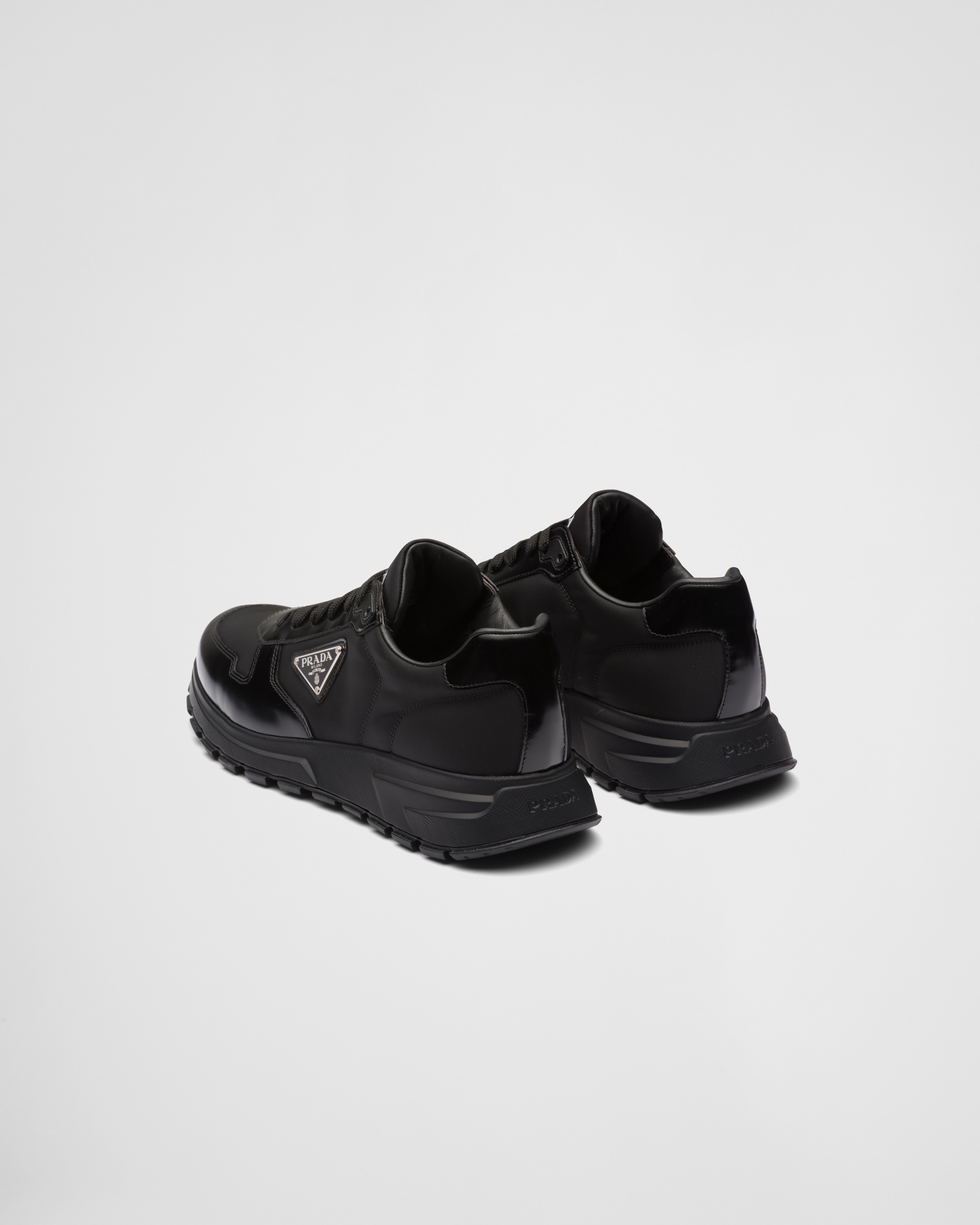 Prada Prada Re-Nylon and brushed leather sneakers | REVERSIBLE