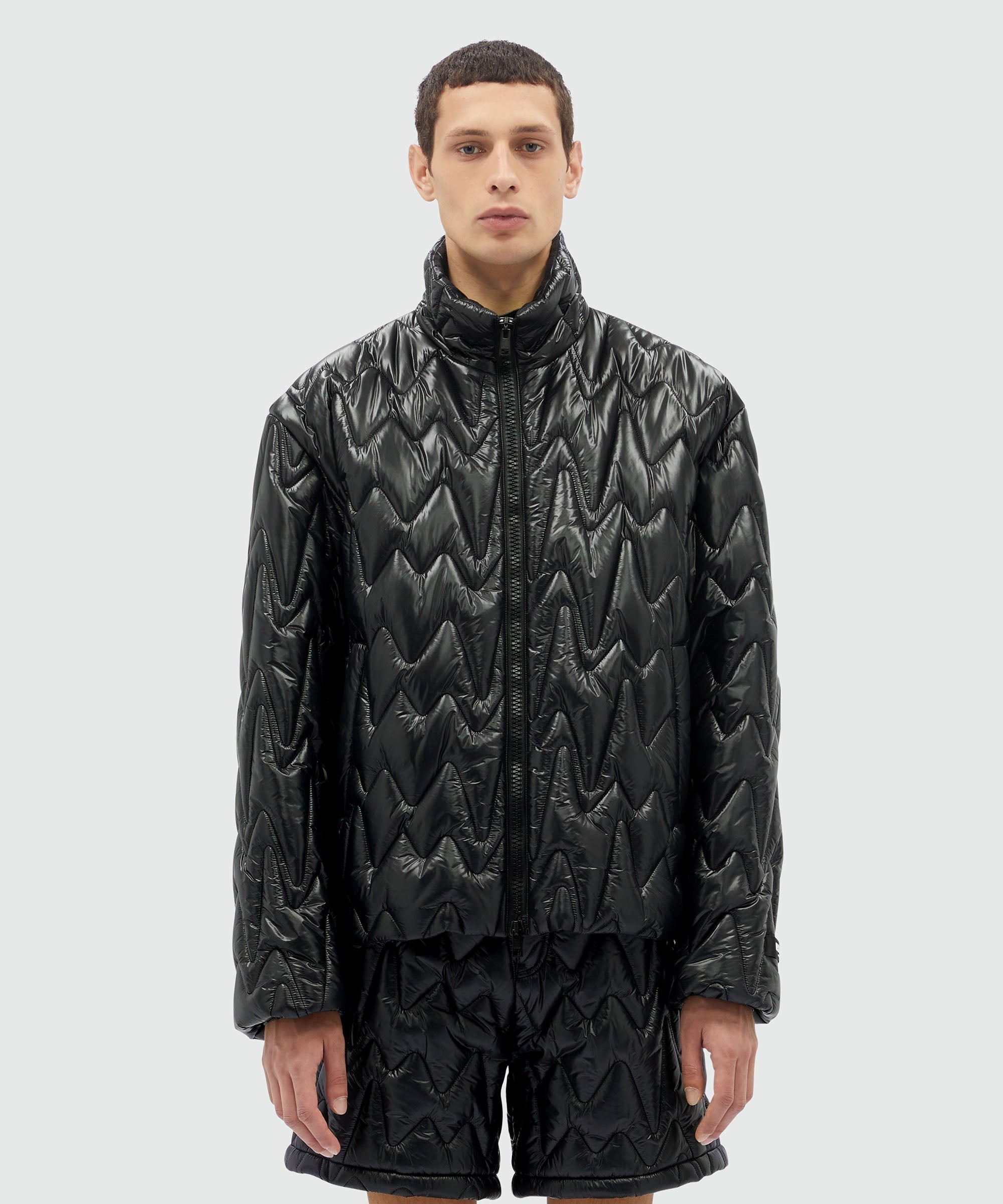 Black quilted jacket with "TheMwave" motif - 2