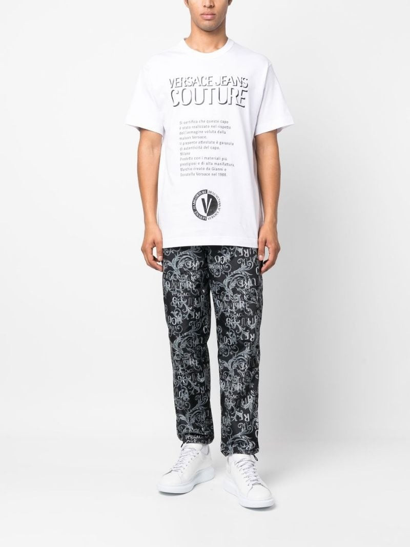 VERSACE JEANS COUTURE logo baroque print trousers outlook