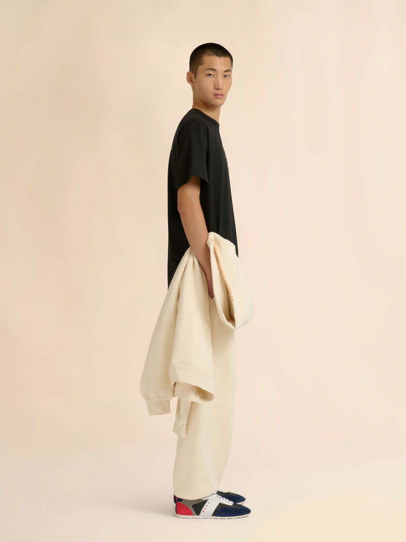 MARNI + MADHAPPY CREAM COTTON SWEATPANTS WITH ARCH LOGO PRINT - 6