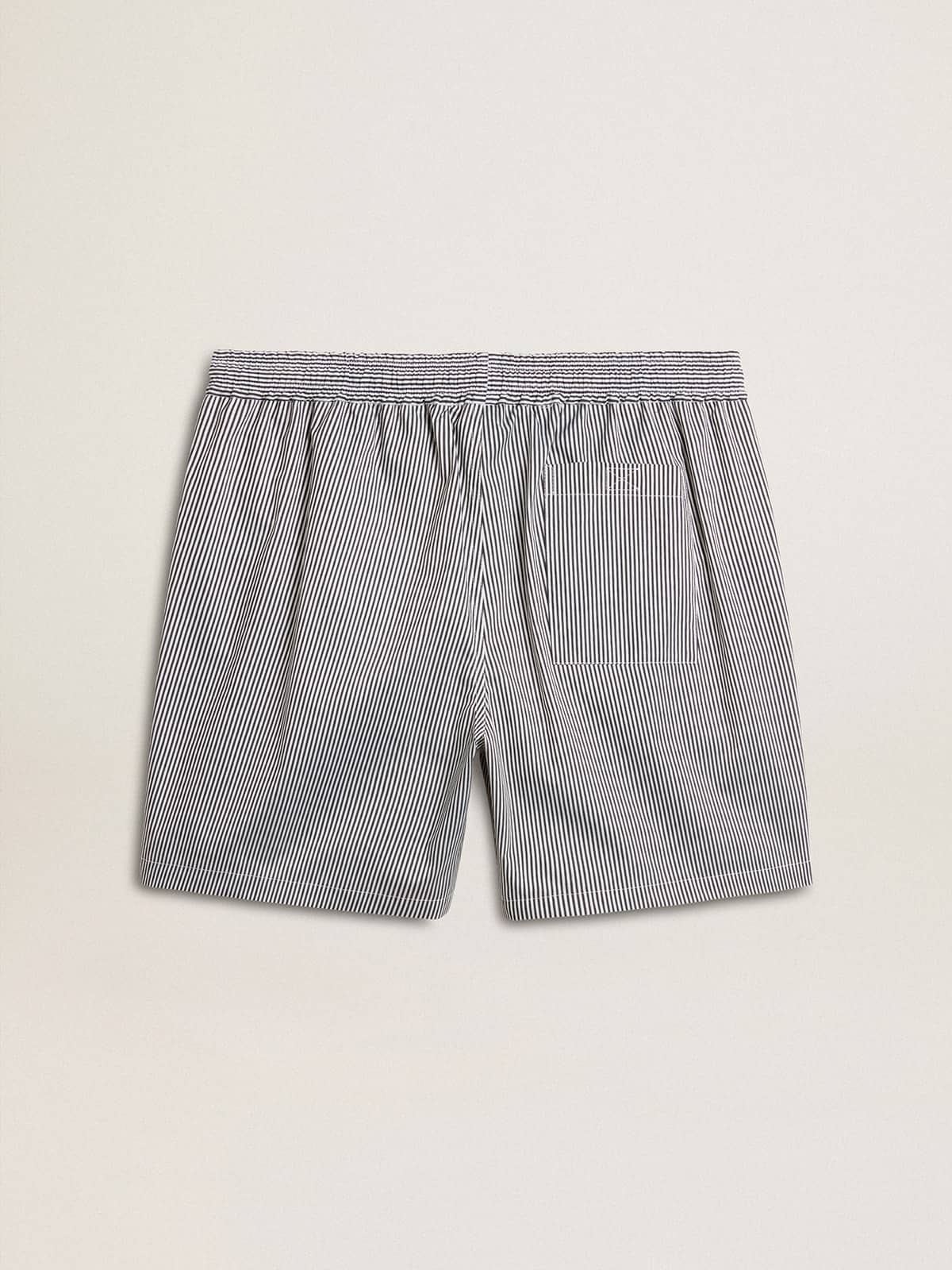 Swim shorts in blue and white striped technical fabric - 7