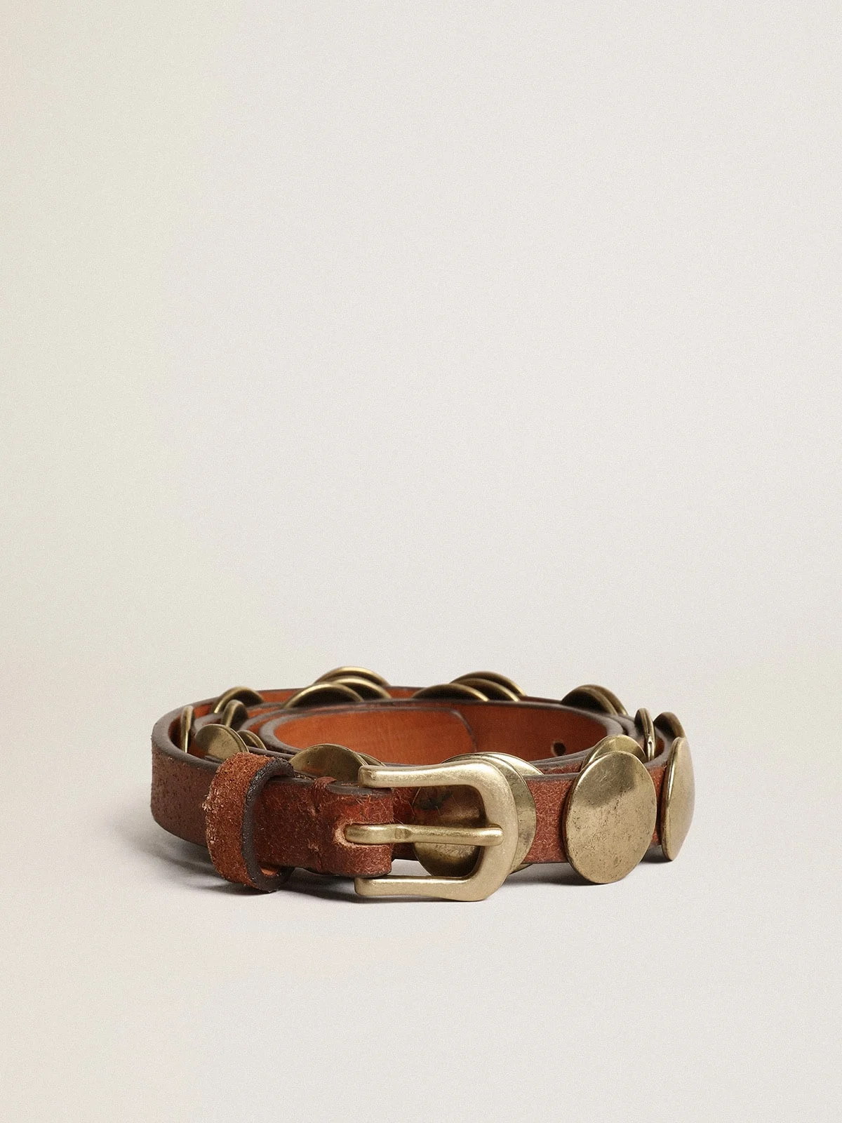 Trinidad belt in aged tan-colored leather with golden maxi studs - 1