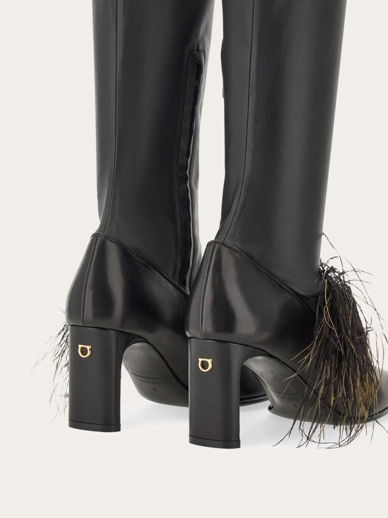Knee high boot with detachable feathers 7