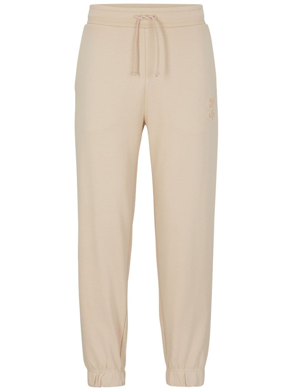 logo-embossed track pants - 1