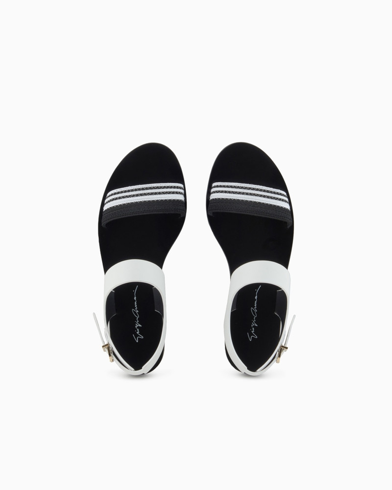 FLAT SANDALS IN LEATHER AND FABRIC 3