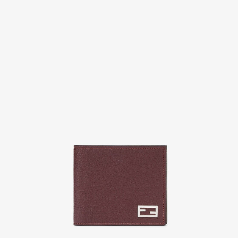 Wallet with eight interior card slots and two compartments for banknotes. Made of burgundy Cuoio Rom 1