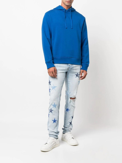 AMIRI star-patch stonewashed jeans outlook