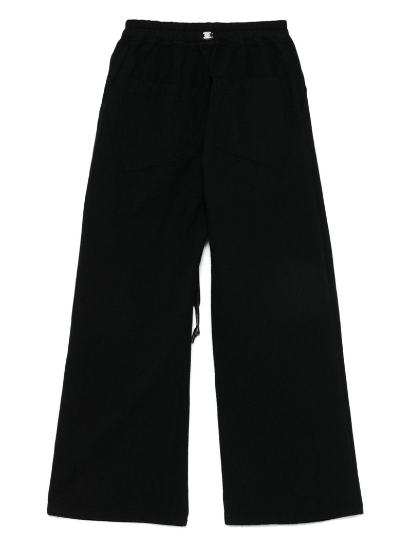 Isaac Sellam striped trousers outlook