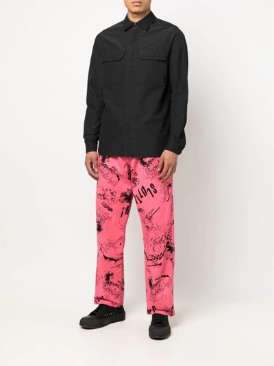 Comme des Garçons SHIRT graffiti-print straight-leg trousers outlook